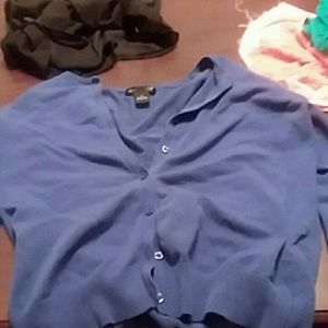 Medium long sleeved button up blue sweater
